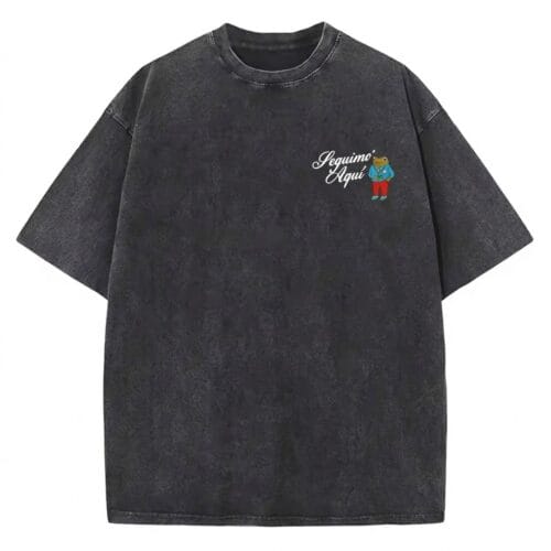 Washed black Bad Bunny T-shirt front view close-up with Seguimo Aqui script logo and character icon
