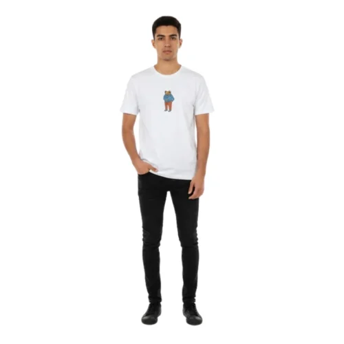 Man wearing white Bad Bunny T-shirt with small illustrated coqui character chest graphic