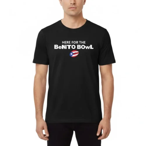 Close-up of man wearing black Bad Bunny T-shirt with Here For The Benito Bowl text and Puerto Rico flag football graphic