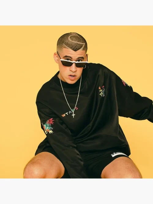 Bad Bunny seated in sunglasses on a yellow background, floor pillow photo print